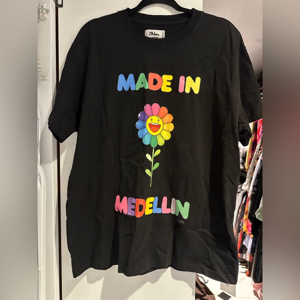 Vibrant Black Tee with Colorful Flower Design